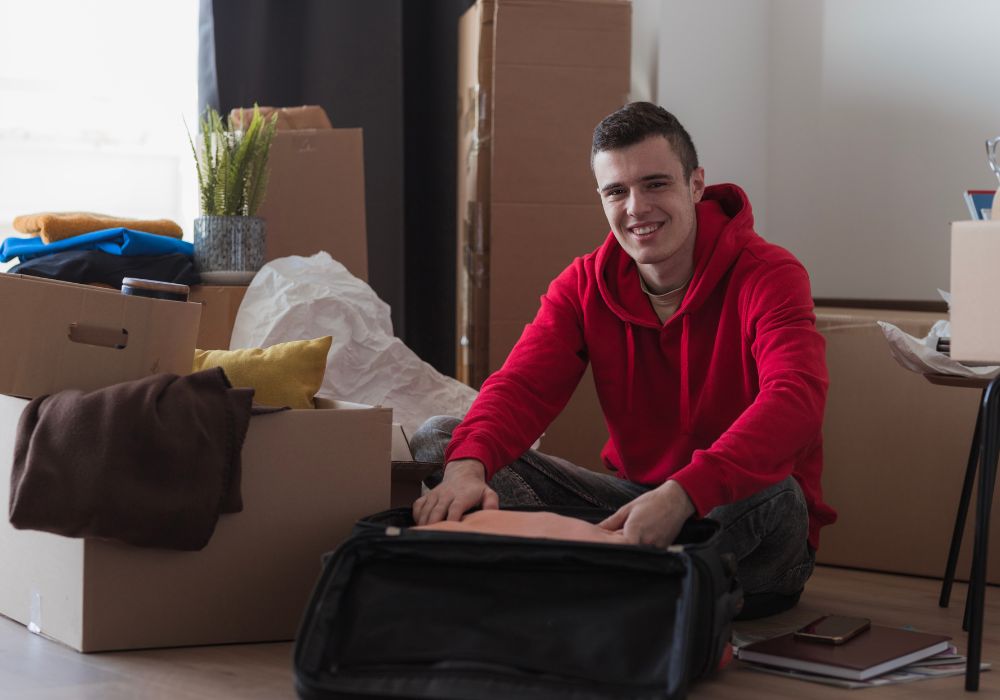 Professional packing a suitcase for an international work relocation
