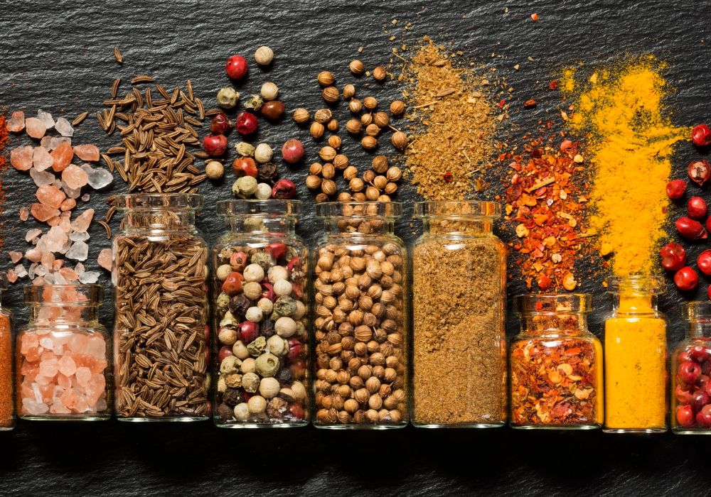 Jars of Indian spices packed for a move to the UK