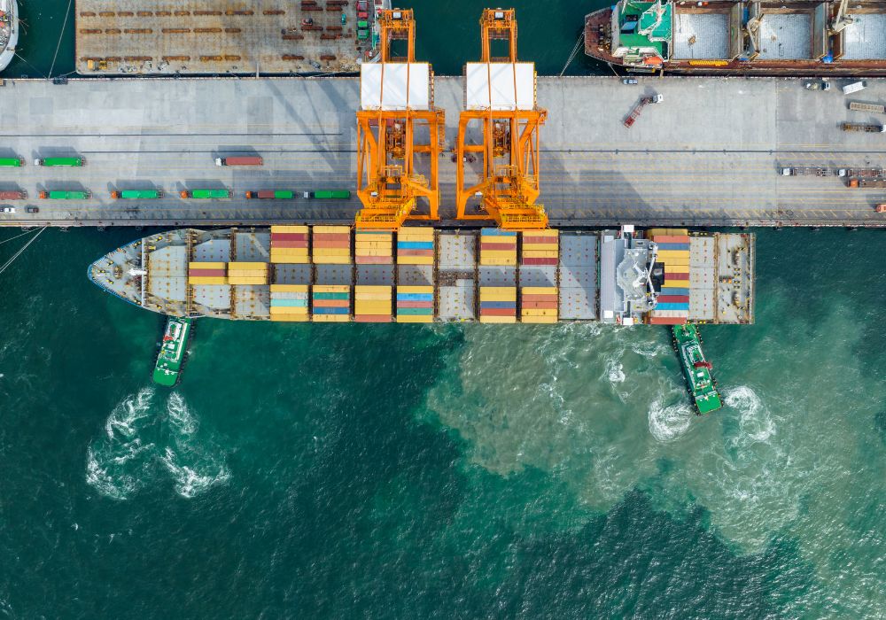 Container ship at port carrying sea freight to Australia
