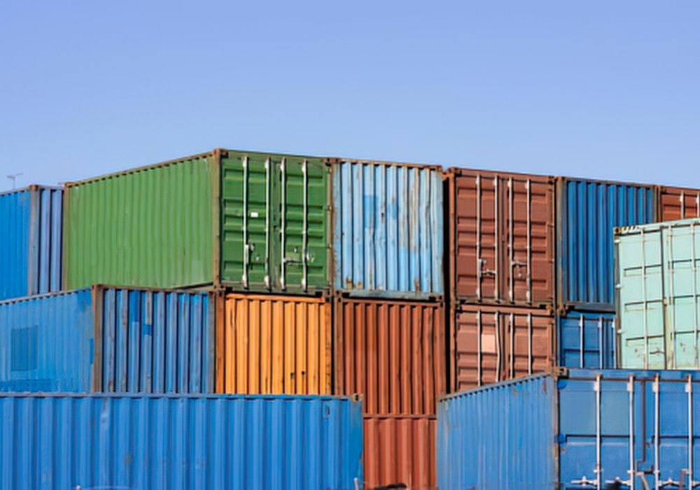 Shipping containers stacked at a port ready for the USA